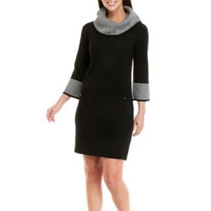 Sweater dress with boat neckline.